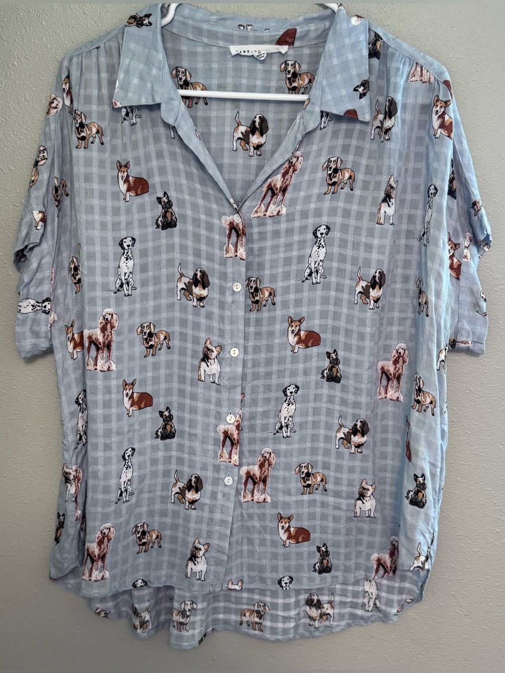 Women’s Blouse with Short Sleeves.  Blue with All Over Dog Motif.